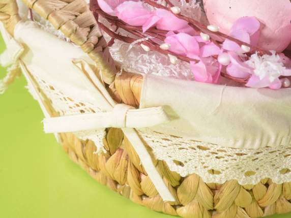 Panier tressé en jacinthe avec poignées recouvertes de tissu
