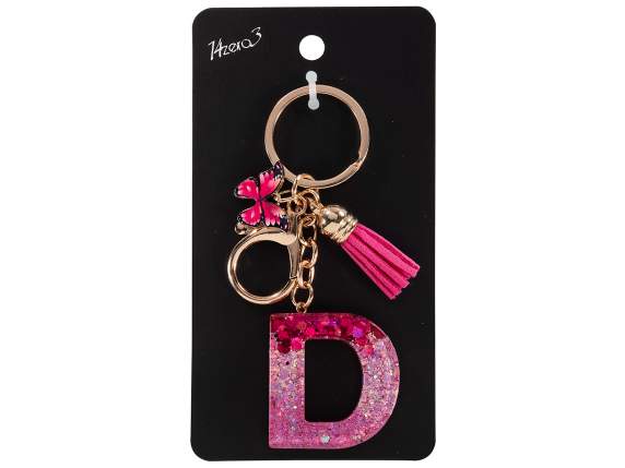Porte-clés - breloque lettre D en résine avec pompon