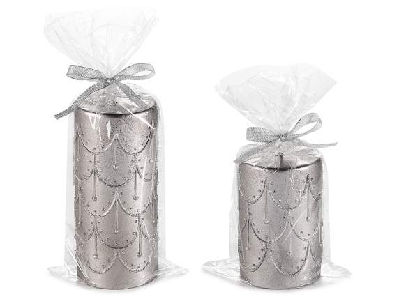 Set of 2 silver candles with relief decorations in single pa