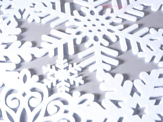 Cloth table runner with snowflake carvings