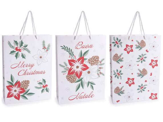 Bolsa-sobre de papel grande con estrellas navideñas y asas.