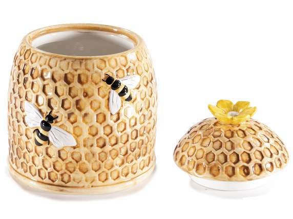 Tarro de cerámica con forma de panal y abejas en relieve