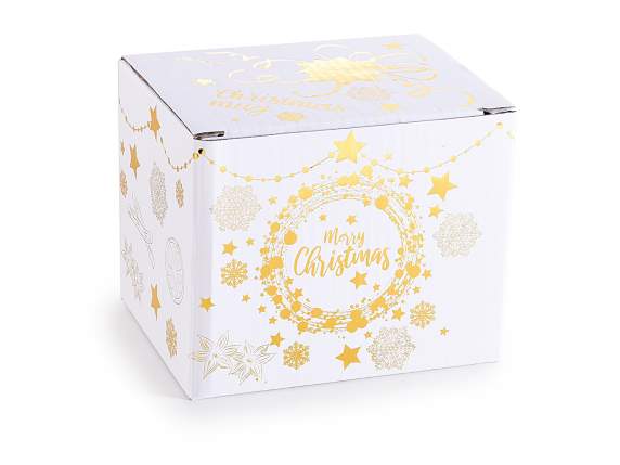 Taza de porcelana con decoraciones navideñas doradas en caja