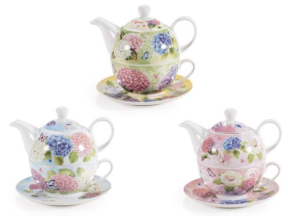 Service de tasses, théières et soucoupes en porcelaine décor