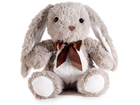 Lapin en peluche douce avec un nœud et de longues oreilles
