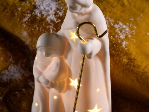 Crèche en porcelaine blanche avec détails dorés et lumières