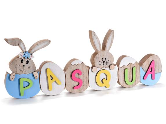 Pâques écrit en bois coloré avec des oeufs et des lapins