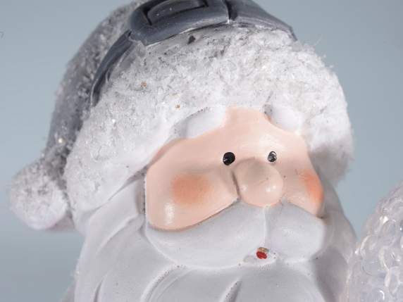 Figurine de Noël en terre cuite avec boule de neige et lumiè