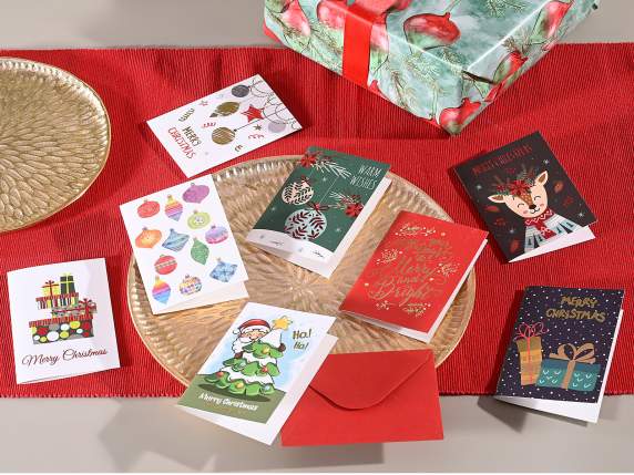 Christmas greeting card with decorations and red envelope