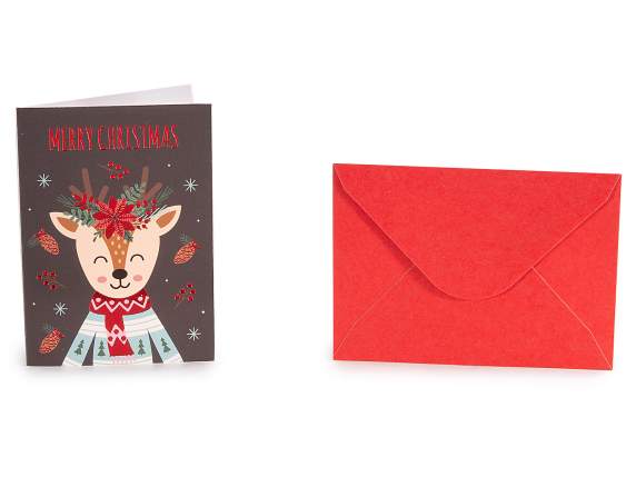 Christmas greeting card with decorations and red envelope