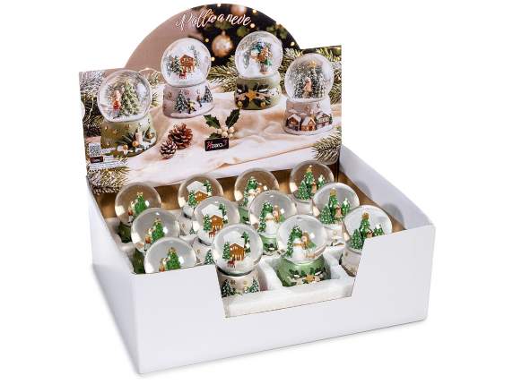 Snow globe with Christmas landscape on a resin base