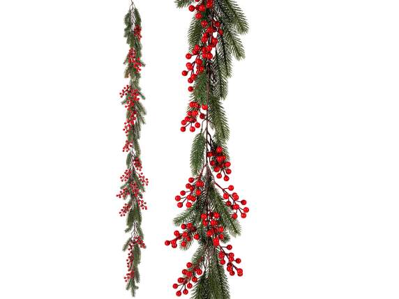 Garland festoon with artificial pine branches, red berries