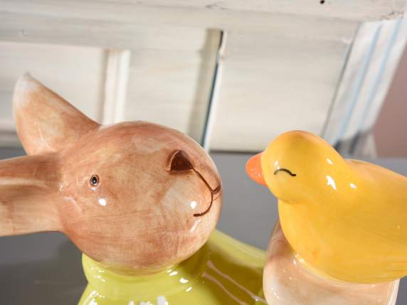 Set of 3 lying bunnies with colored ceramic chick