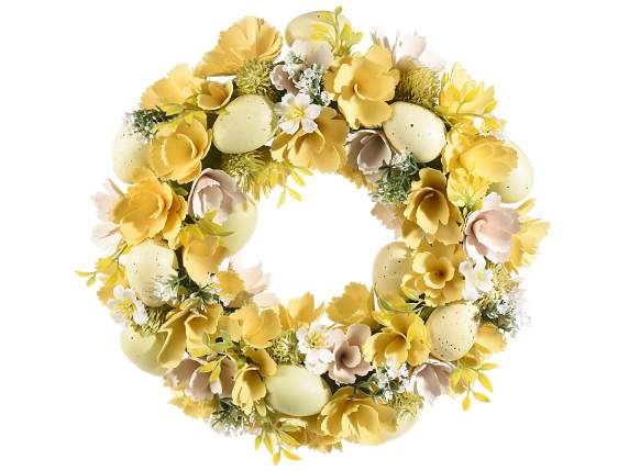 Colorful wooden flower wreath and eggs