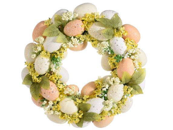 Wreath with glitter eggs, berries and flowers