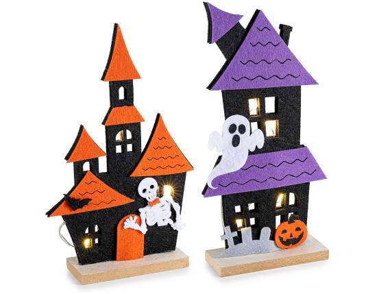 Halloween haunted house made of cloth on a wooden base