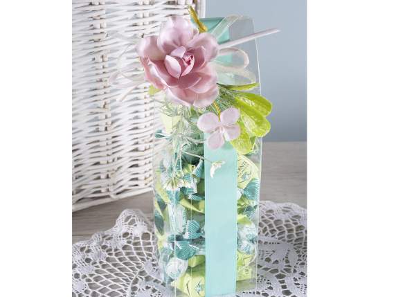 Artificial rose with small flowers and ribbon with bow