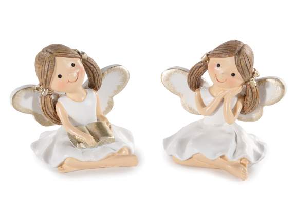 Little angel in colored resin with golden details