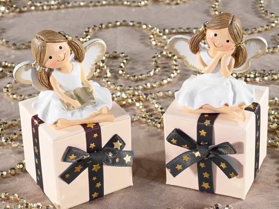 Little angel in colored resin with golden details