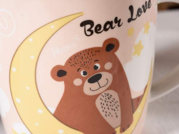 Glossy porcelain mug with teddy bear decoration