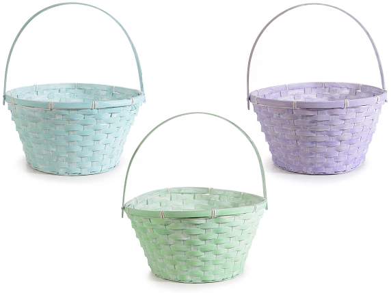 Round basket in colored bamboo with reclining handle
