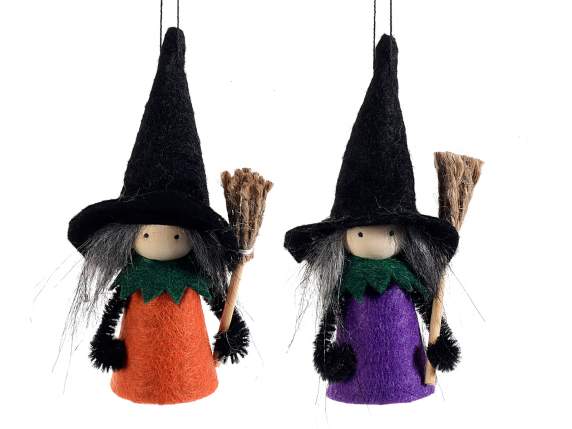 Witch-Befana in cloth with broom to hang