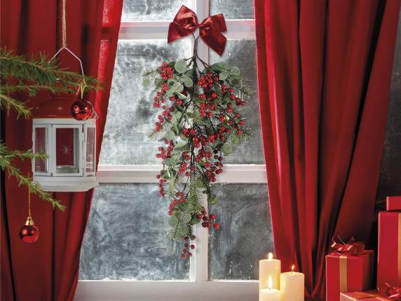 Artificial pine branch with red berries for hanging