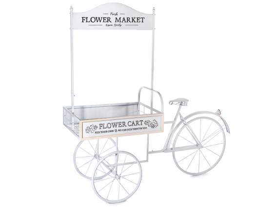 White metal display cart with bicycle