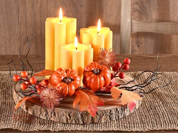 Branch with pumpkin, hedgehog, leaves and artificial berries