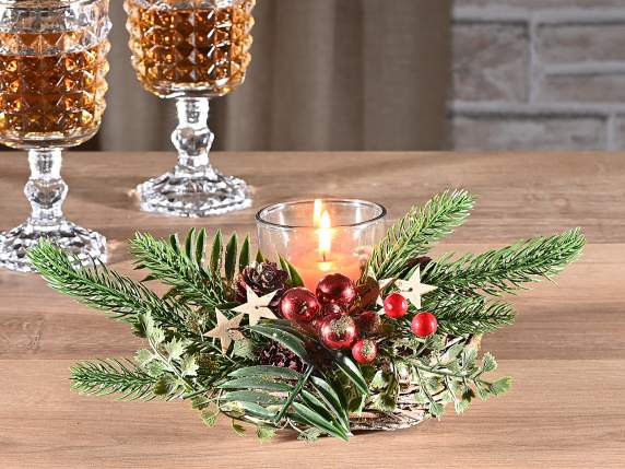 Centerpiece with pine cones, berries, balls, candle holder
