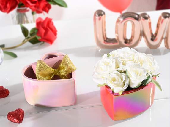 Heart-shaped ceramic vase with a shiny, iridescent effect