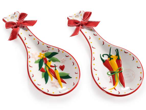 Ceramic spoon rest with Portafortuna relief decorations