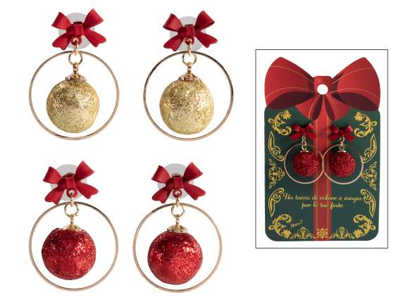 Pair of metal earrings with Christmas ball and bow