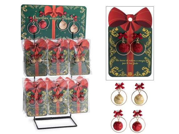 Pair of metal earrings with ball and bow with display