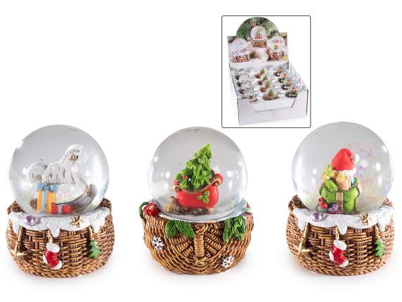 Snow globe with Christmas theme on resin basket