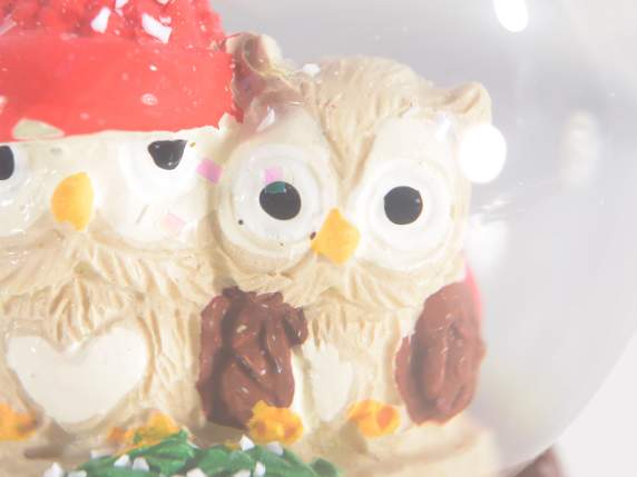 Snow globe with resin animals, in display