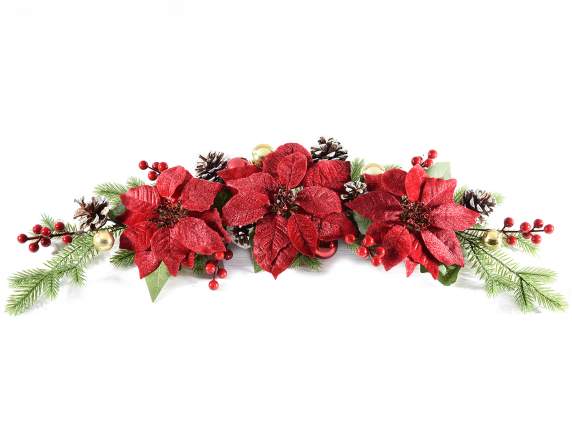 Christmas star garland with balls, pine cones, and berries