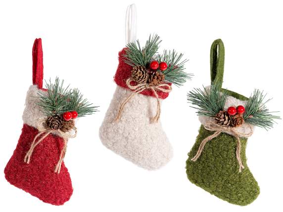 Hanging fabric sweets stocking with pine and pine cones