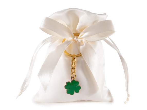 Satin effect bag with metal four-leaf clover key ring
