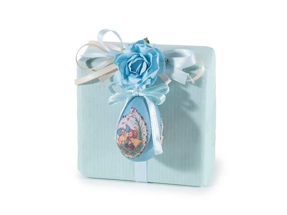 Easter egg covered in decorated paper to hang