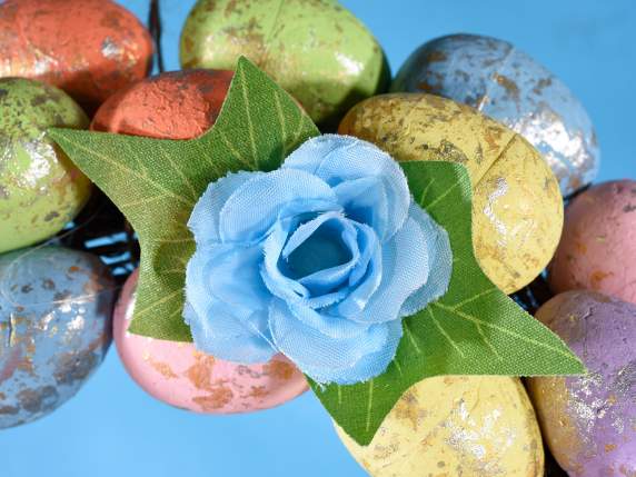 Garland of gold-silver brushed colored eggs with flowers