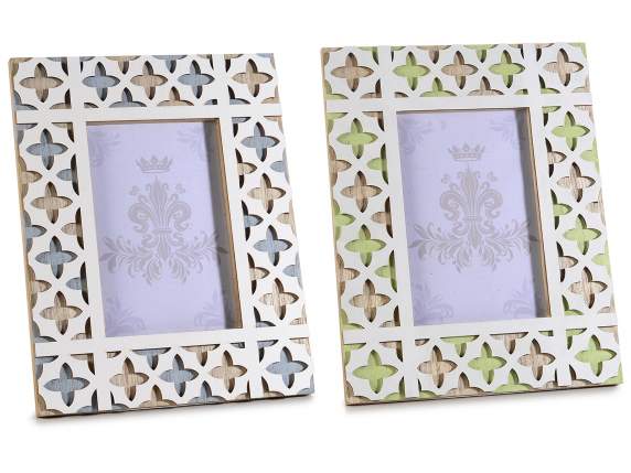 Wooden photo frame with colored carvings to rest