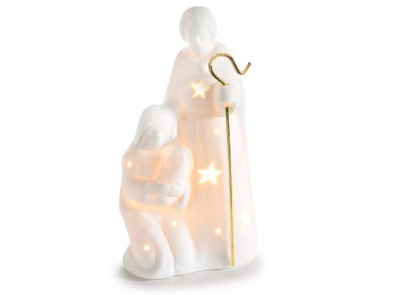 Crib in white porcelain with golden detail and LED lights