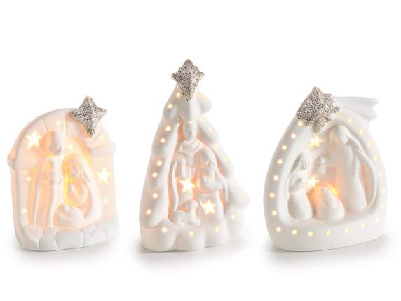 Crib in opaque white porcelain, glitter and LED lights