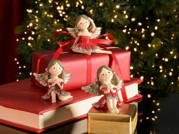 Little angel in colored resin with golden details