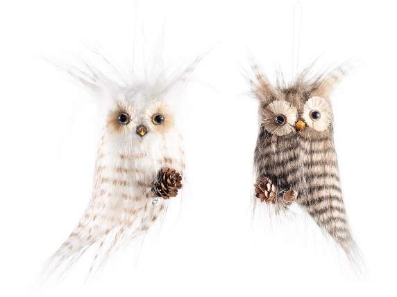 Soft eco-fur owl on a branch with a pine cone to hang