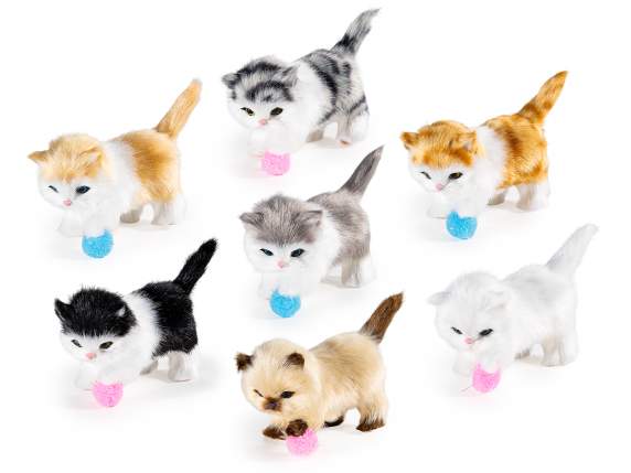 Decorative kitten playing in fake fur