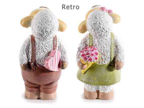 Resin sheep with heart and flower decorations to place
