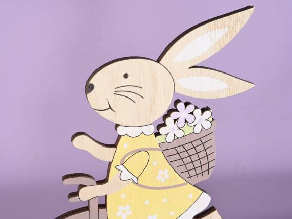 Wooden bunny on bicycle with Easter baskets