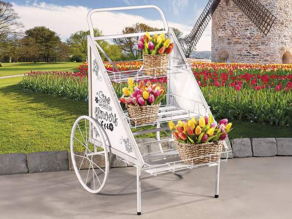 White metal display cart decorated with 3 shelves